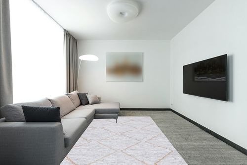 SAFAVIEH Vintage Leather Collection Area Rug - 6' x 9', Light Grey & Natural, Handmade Modern Rustic Boho, Ideal for High Traffic Areas in Living Room, Bedroom (VTL803F) in Modern Living Room with Grey Couch