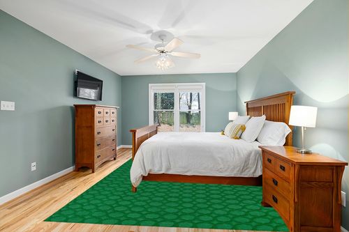 Garland Rug Garden Trellis 9 ft. x 12 ft. Indoor/Outdoor Area Rug Green in Teal and Orange Wood Bedroom