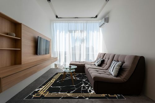 Antep Rugs Babil Gold 8x10 Abstract Marble Geometric Indoor Area Rug (Black, 7'10" x 10') in Grey Living Room with Brown Couch