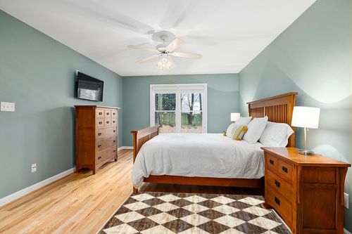 nuLOOM Meline Checkered Fringe Area Rug, 4x6, Beige in Teal and Orange Wood Bedroom