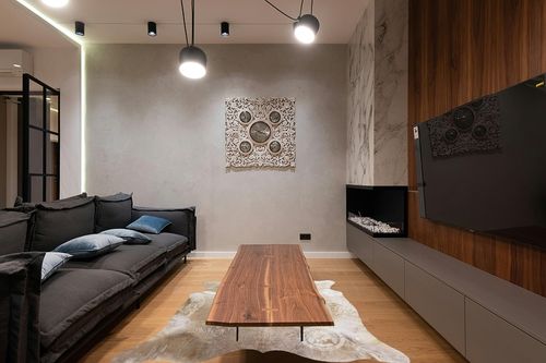 Genuine Taupe Grey Cowhide Rug 6 x 6-7 ft. 180 x 220 cm in Dark Wood Living Room with Black Couch