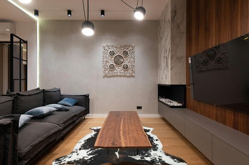 HIDES BAZAAR Dark Brindle Cowhide Rug, Premium Quality Genuine Leather Cow Hide, Dark Brown, Black and White Area Rug (6x7 ft) in Dark Wood Living Room with Black Couch