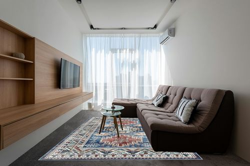 COZYLOOM Boho Area Rug 8x10 Distressed Rug Oriental Floral Soft Plush Indoor Carpet for Living Room Bedroom Aesthetic Accent Rug Cozy & Fluffy Faux Wool Rug Non-Slip Non-Shedding Blue in Grey Living Room with Brown Couch