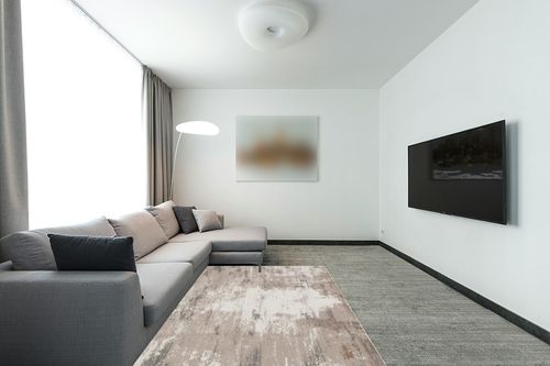 OIGAE Machine Washable Rug 5x7- Low-Pile Area Rug Non-Shedding Foldable Abstract Modern Rugs, Stain Resistant Anti Slip Backing Rugs for Living Room&Bedroom&Dining Laundry Home Office Carpet, Brown in Modern Living Room with Grey Couch