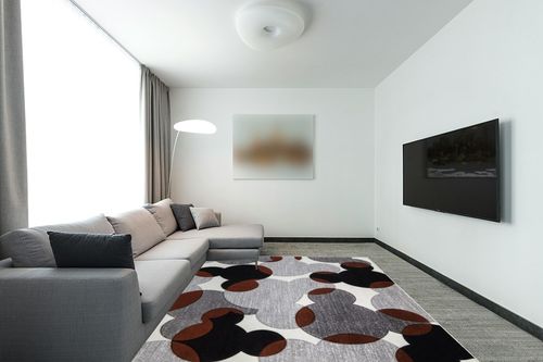 Gertmenian Disney Mickey Mouse Rug Textured Floor Mat Perfect Carpet for Living Room Dining Room Playroom Study Area 8x10 Large, Ears Puzzle Geometric, White Gray Black Red, 46627 in Modern Living Room with Grey Couch