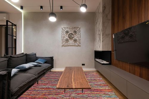 Cotton Multi Chindi Hand Woven Rugs - 8x10 Feet Rectangle Hand Braided Bohemian Colorful Area Rug - Recycled Braided Chindi Rugs- Biodegradable Area Rugs 96x120 inch. in Dark Wood Living Room with Black Couch