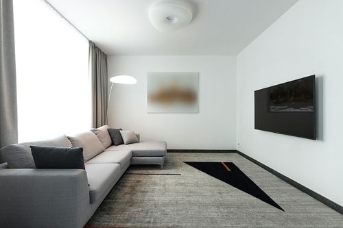SAFAVIEH Fifth Avenue Collection Area Rug - 8' x 10', Ivory & Black, Handmade Mid-Century Modern Abstract New Zealand Wool, Ideal for High Traffic Areas in Living Room, Bedroom (FTV110A) in Modern Living Room with Grey Couch
