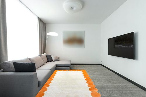 Beige & Orange Irregular Boarder Shape, Modern Handmade Tufted Area Rugs in Beige and Orange Color. in Size 5X8 Feet. in Modern Living Room with Grey Couch