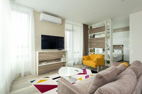 SAFAVIEH Hollywood Collection Area Rug - 5'3" x 7'6", Ivory & Rose, Mid-Century Modern Design, Non-Shedding & Easy Care, Ideal for High Traffic Areas in Living Room, Bedroom (HLW700A) in Light Modern Living Room with TV