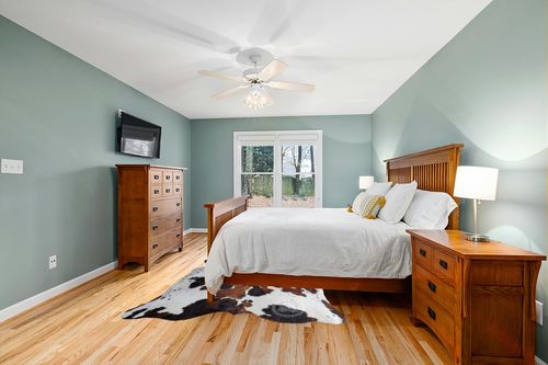 Genuine Tricolor Cowhide Rug XL 6 x 7-8 ft. - 180 x 240cm in Teal and Orange Wood Bedroom