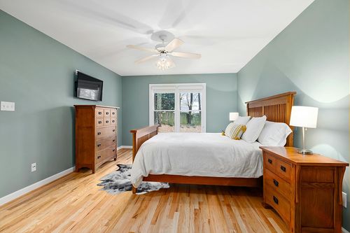 NEOCOZY Exquisite Cowhide Rug, 5.2 x 6.2 ft Faux Cowhide Rug for Living Room Bedroom, Cow Print Rug for Wall,Cow Rugs for Camping picnics, Non-Slip, Cute cowhine Animal Print Floor Rug, Grey White in Teal and Orange Wood Bedroom