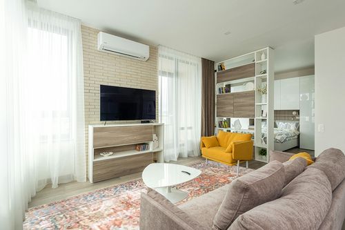 Loloi II Loren Terracotta/Sky 8'-4" x 11'-6" Area Rug in Light Modern Living Room with TV