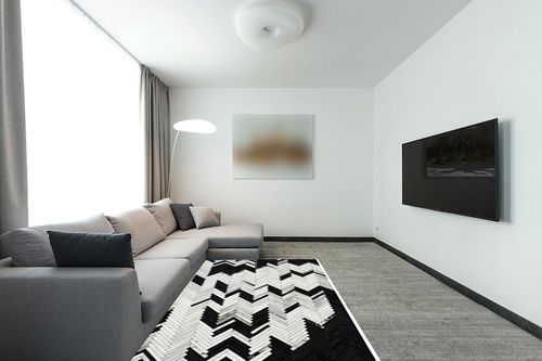 Handmade Black and White Cowhide Patchwork Rug - Black and White with Grayish Stripes Herringbone Chevron Patchwork Cowhide Rug 5 ft X 8 ft in Modern Living Room with Grey Couch