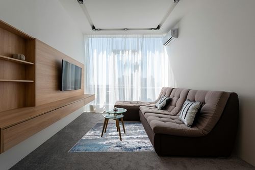 Blue Bohemian Stain Resistant Living Room Area Rug in Grey Living Room with Brown Couch