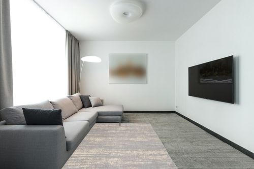 Nourison Essentials Indoor/Outdoor Solid Abstract Grey/Beige 5' x 7' Area Rug, Easy Cleaning, Non Shedding, Bed Room, Living Room, Dining Room, Backyard, Deck, Patio (5x7) in Modern Living Room with Grey Couch