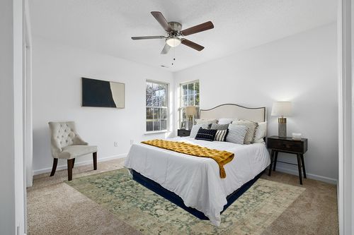 Magnolia Home by Joanna Gaines x Loloi Sinclair Collection SIN-05 Jade / Sand 7'-6" x 9'-6" Area Rug in White and Yellow Modern Bedroom