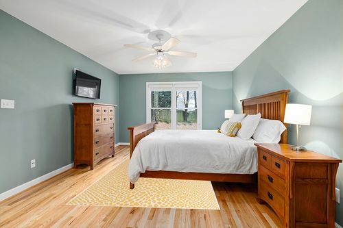 Unique Loom Jill Zarin Outdoor Collection Area Rug - Cape Town (6' x 9' Rectangle Yellow Ivory/Ivory) in Teal and Orange Wood Bedroom