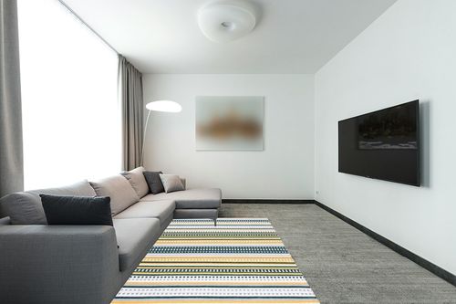 SAFAVIEH Montauk Collection Area Rug - 5' x 8', Yellow & Ivory, Handmade Boho Stripe Cotton, Ideal for High Traffic Areas in Living Room, Bedroom (MTK451D) in Modern Living Room with Grey Couch