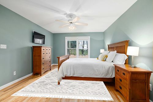 nuLOOM Ansley Moroccan Lattice Tassel Area Rug, 7' 10" x 10' 10", Beige in Teal and Orange Wood Bedroom