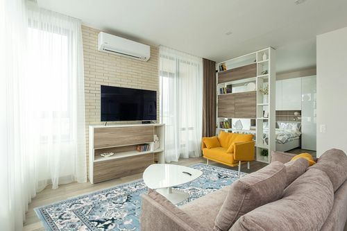 SAFAVIEH Isabella Collection Area Rug - 8' x 10', Light Blue & Cream, Oriental Design, Non-Shedding & Easy Care, Ideal for High Traffic Areas in Living Room, Bedroom (ISA921M) in Light Modern Living Room with TV