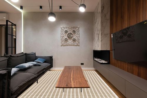 Dash and Albert Gridiron Wheat Handwoven Indoor/Outdoor Rug, 8 X 10 Feet, Neutral Geometric Pattern in Dark Wood Living Room with Black Couch