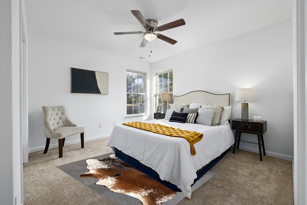 Cowhide rug in bedroom ideas in White and Yellow Modern Bedroom