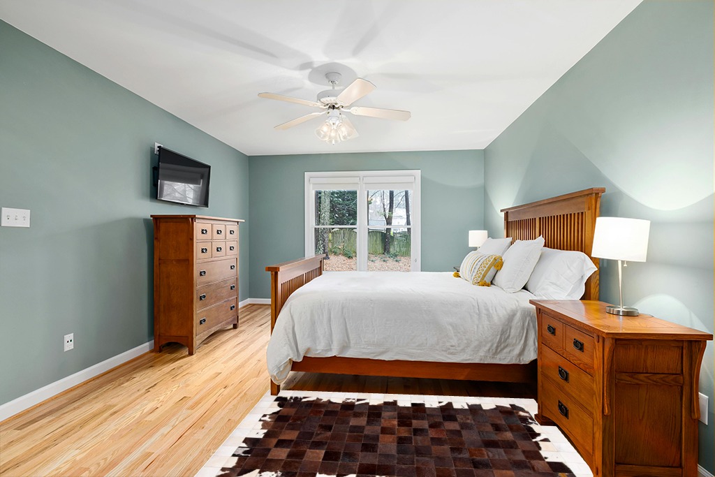 Cowhide rug in bedroom ideas in Teal and Orange Wood Bedroom