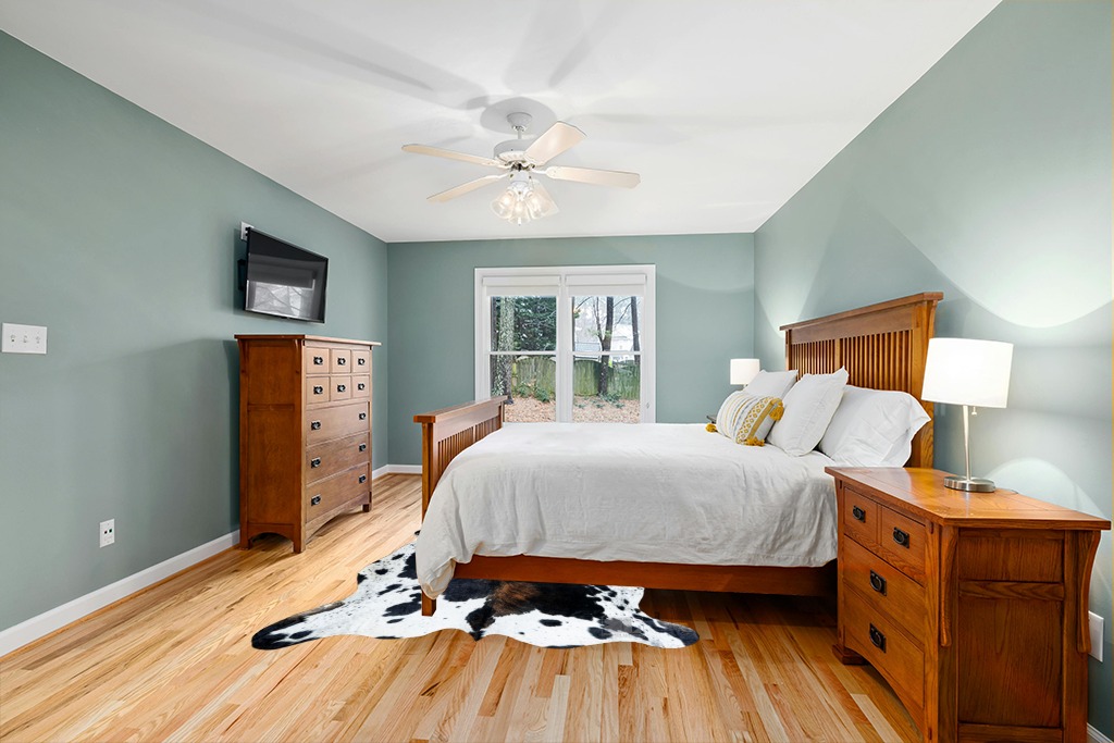 Cowhide rug in bedroom ideas in Teal and Orange Wood Bedroom