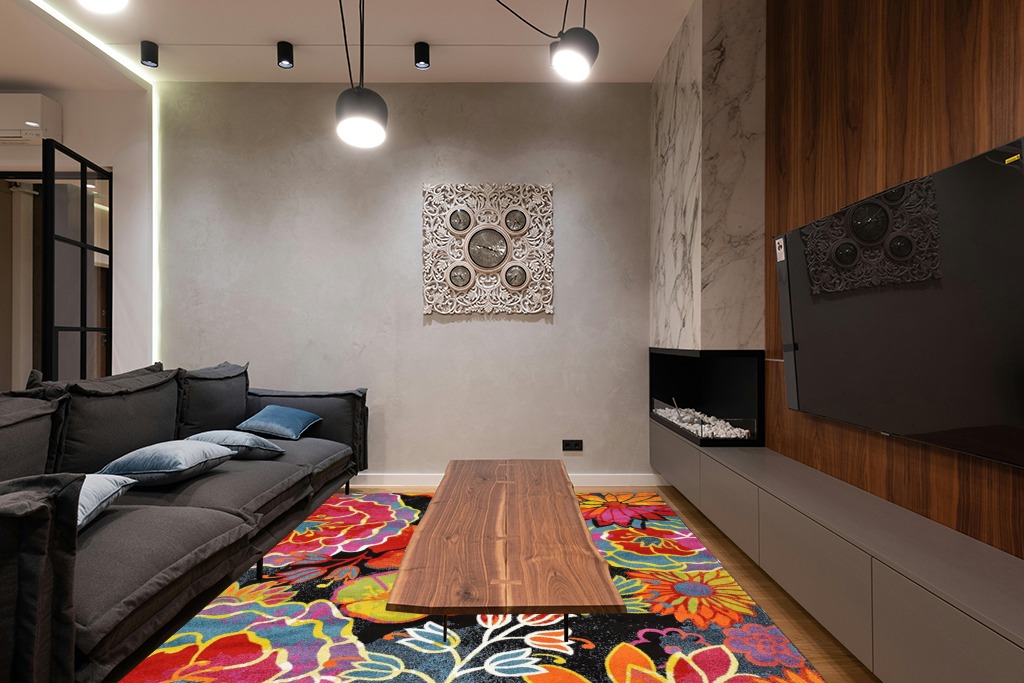 Yellow rug ideas in Dark Wood Living Room with Black Couch