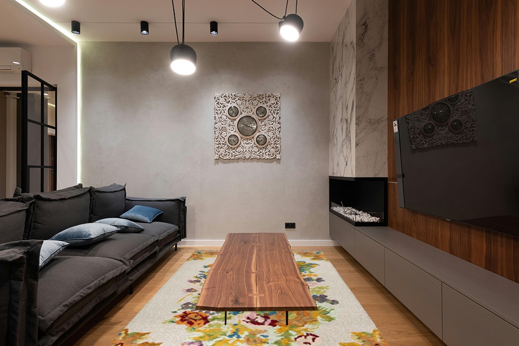 SAFAVIEH Kenya Collection Area Rug - 6' x 9', Orange & Light Grey, Hand-Knotted Floral Tassel Wool, Ideal for High Traffic Areas in Living Room, Bedroom (KNY801W) in Dark Wood Living Room with Black Couch