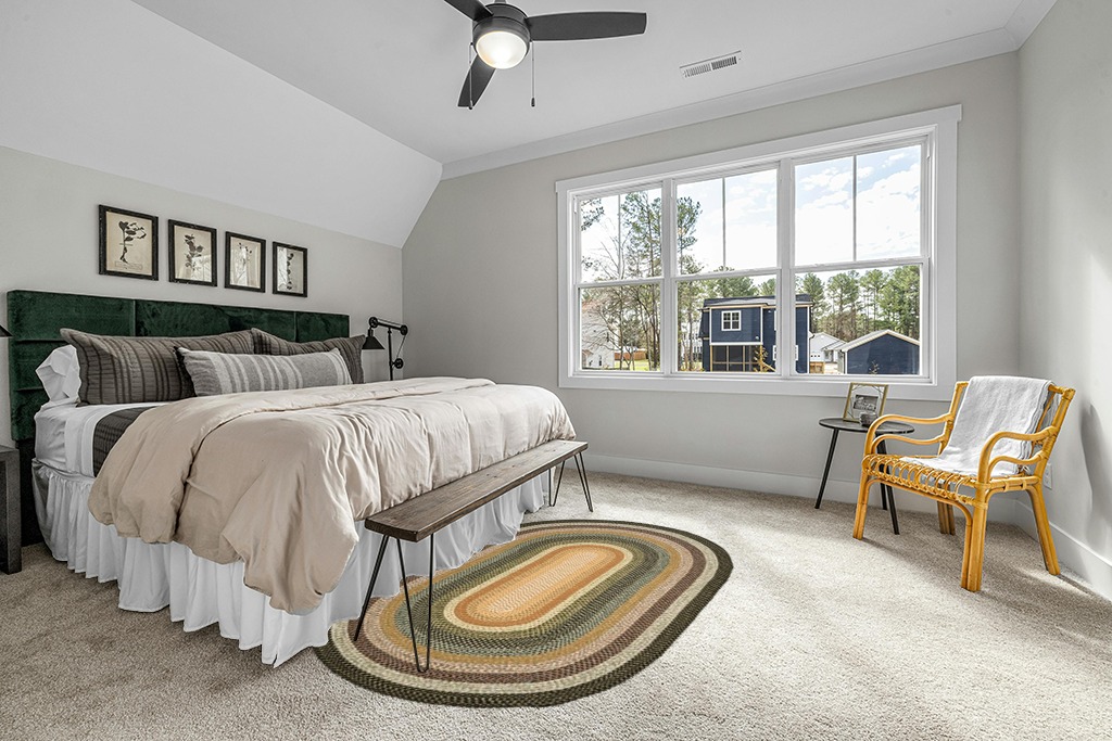 SAFAVIEH Braided Collection Area Rug - 5' x 8' Oval, Multi, Handmade Country Cottage Reversible, Ideal for High Traffic Areas in Living Room, Bedroom (BRD308A) in Grey Traditional Bedroom with King Bed
