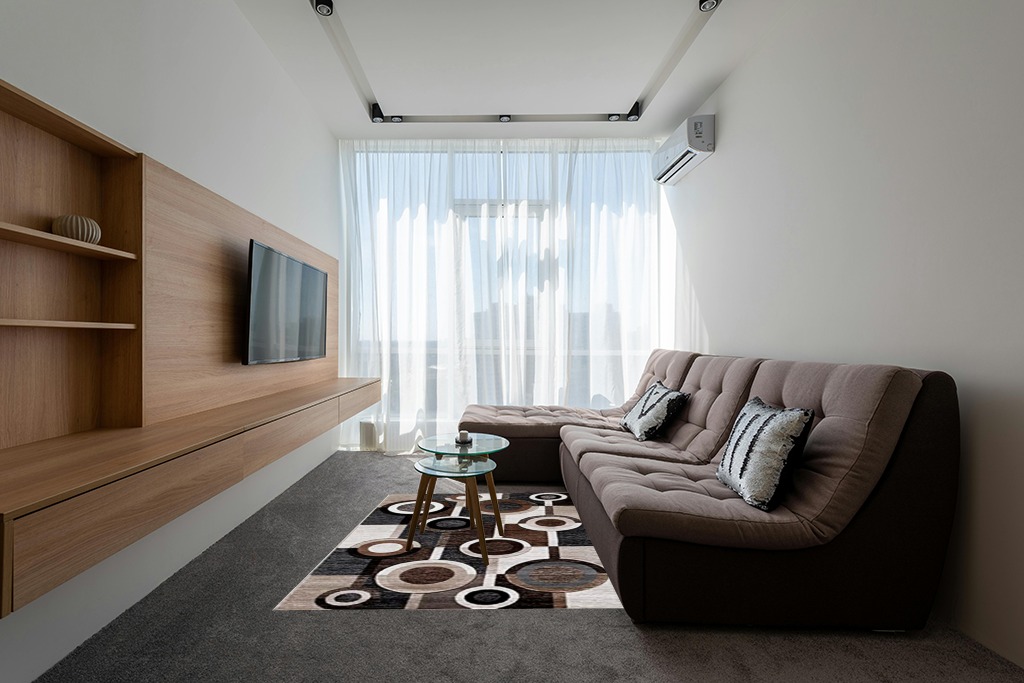 Signature Design by Ashley Guintte Modern 5 x 7 Medium Pile Multilayered Geometric Design Rug, Black, Brown & Cream in Grey Living Room with Brown Couch
