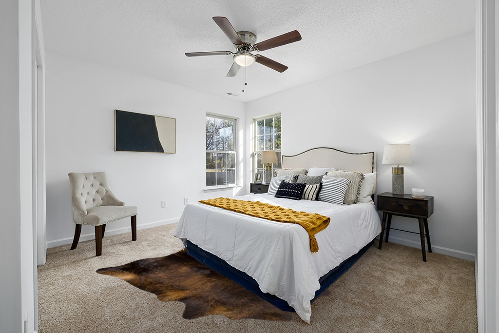 Cowhide rug in bedroom ideas in White and Yellow Modern Bedroom
