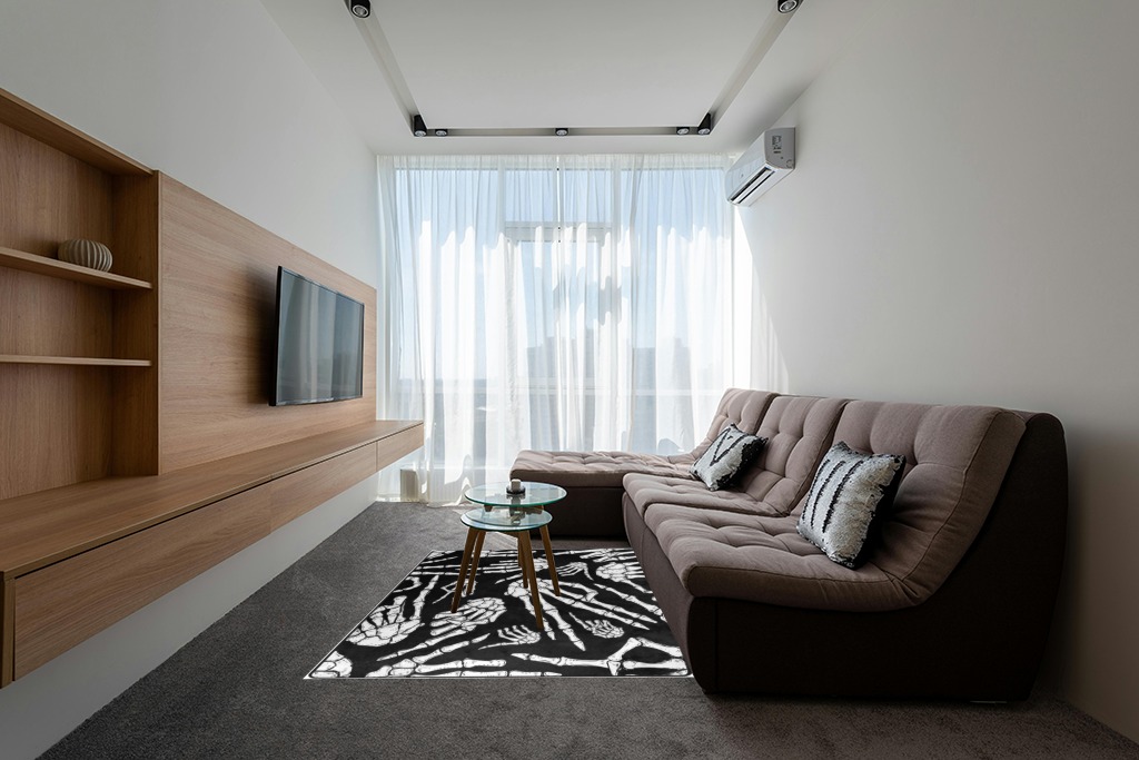 Black and white rug ideas in Grey Living Room with Brown Couch