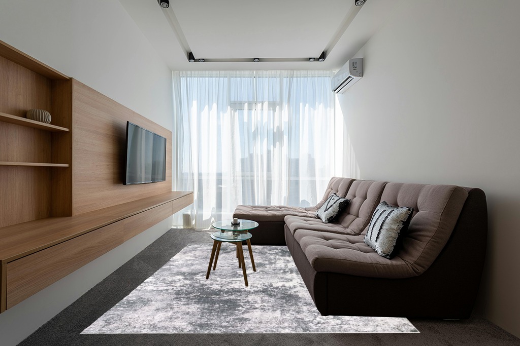Rugs on grey carpet ideas in Grey Living Room with Brown Couch