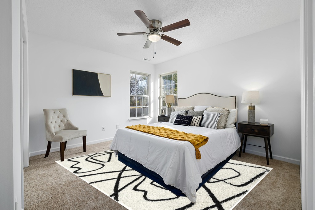 Rug on carpet bedroom ideas in White and Yellow Modern Bedroom