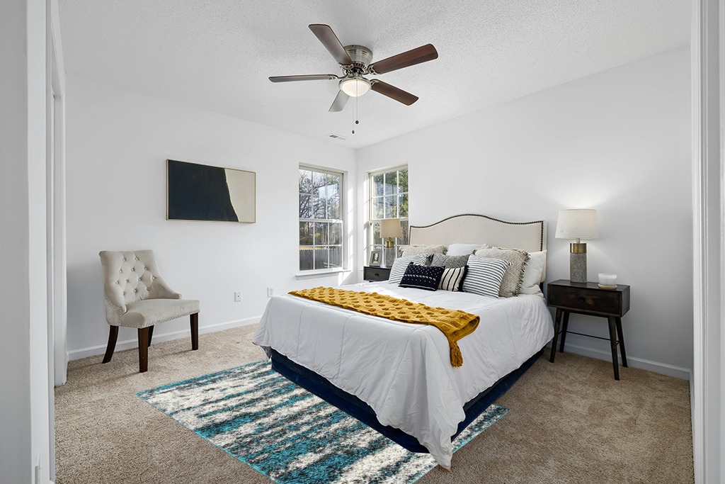 Rug on carpet bedroom ideas in White and Yellow Modern Bedroom