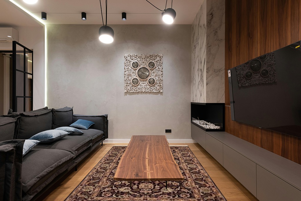 Modern living room rug ideas in Dark Wood Living Room with Black Couch