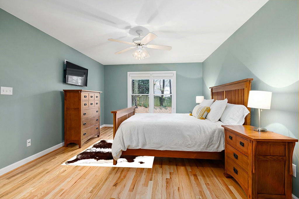 Cowhide rug in bedroom ideas in Teal and Orange Wood Bedroom