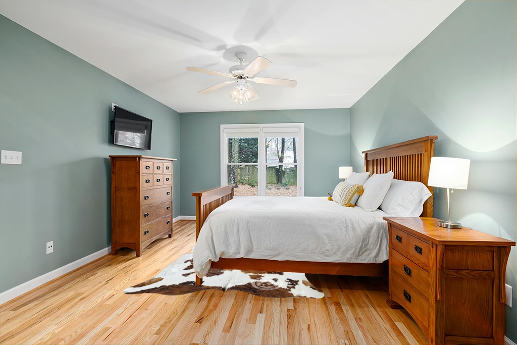 Cowhide rug in bedroom ideas in Teal and Orange Wood Bedroom