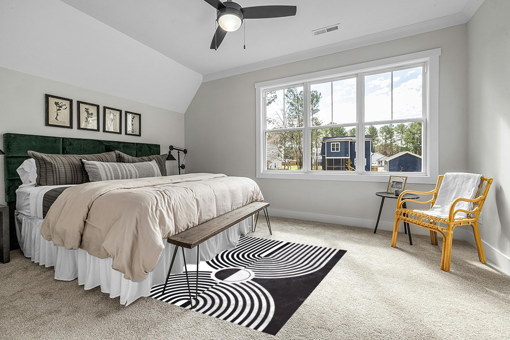 Rug on carpet bedroom ideas in Grey Traditional Bedroom with King Bed
