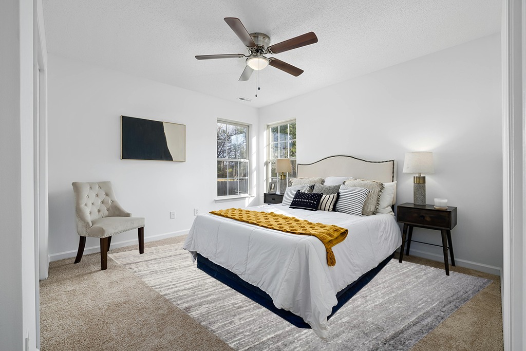 Rug on carpet bedroom ideas in White and Yellow Modern Bedroom