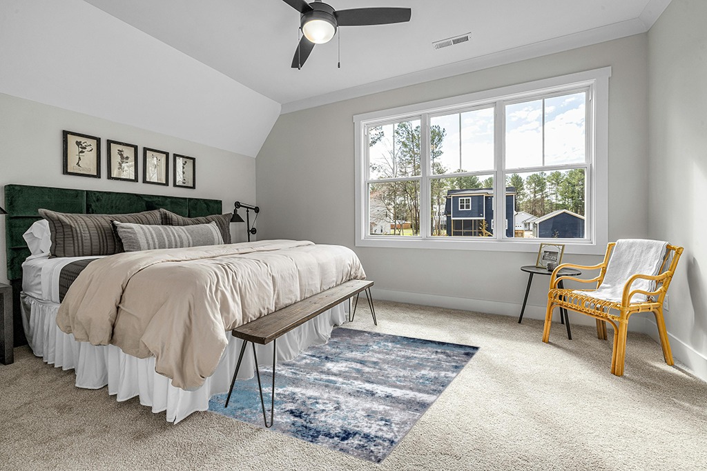 Rug on carpet bedroom ideas in Grey Traditional Bedroom with King Bed