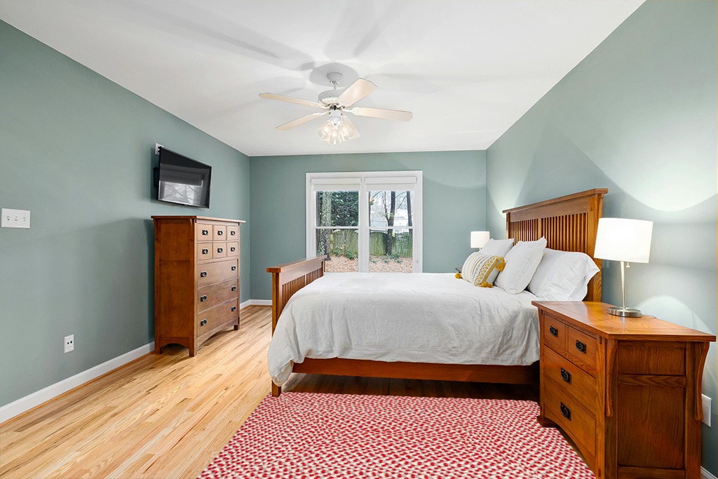 Farmhouse rug ideas in Teal and Orange Wood Bedroom