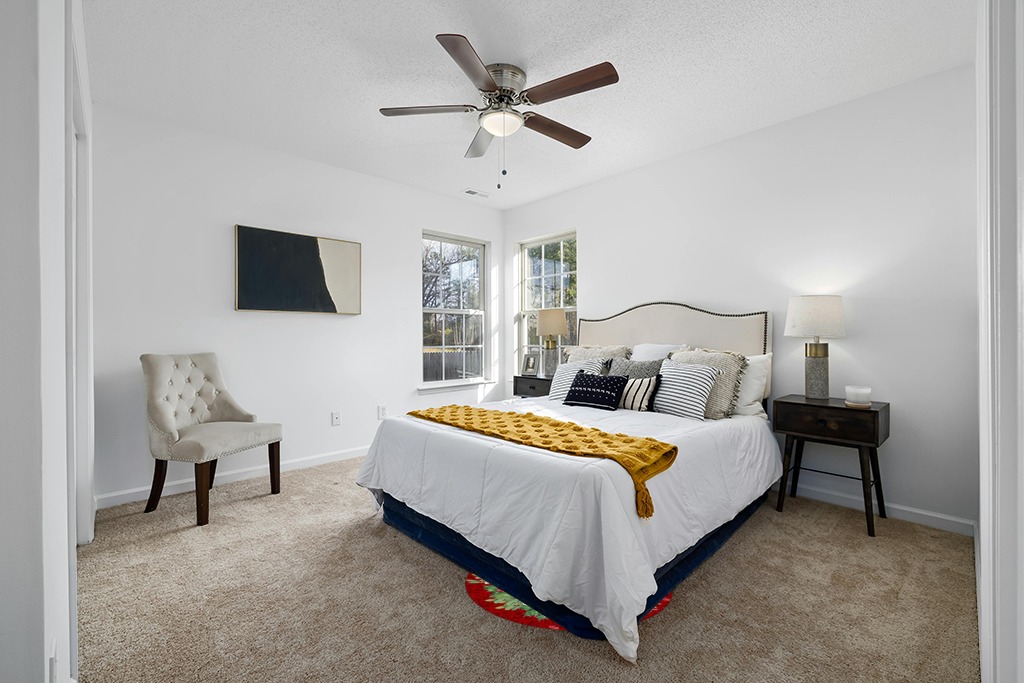 Rug over carpet ideas in White and Yellow Modern Bedroom