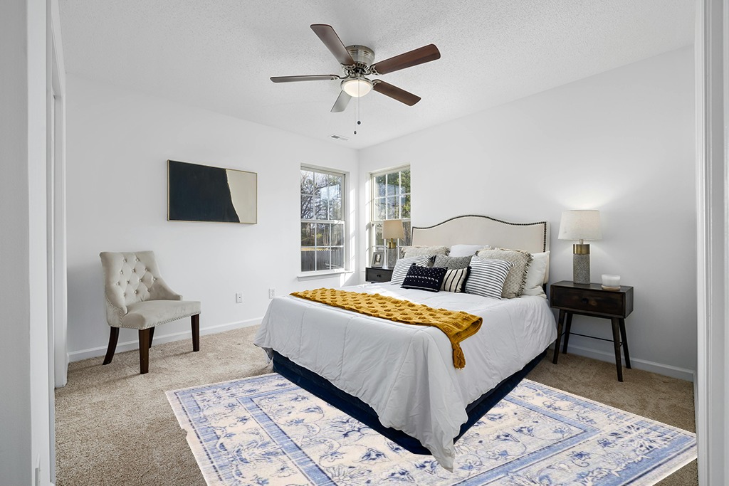 Rug on carpet ideas in White and Yellow Modern Bedroom