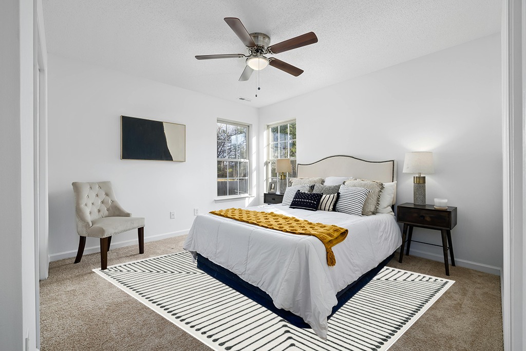 Rug on carpet bedroom ideas in White and Yellow Modern Bedroom