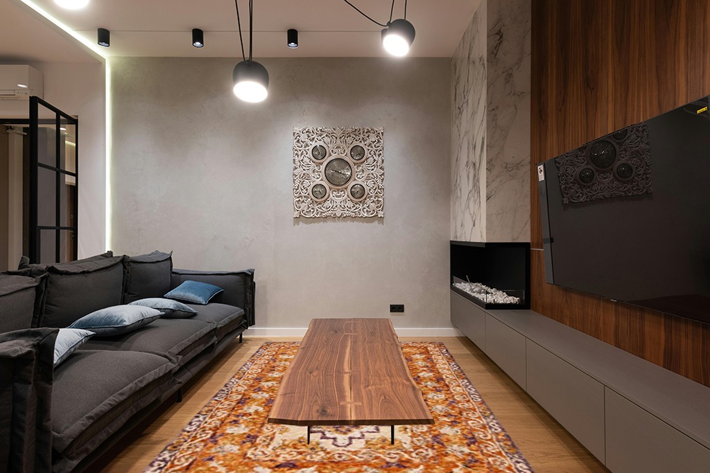 SAFAVIEH Aspen Collection Area Rug - 6' x 9', Brown & Purple, Handmade Southwestern Tribal Wool, Ideal for High Traffic Areas in Living Room, Bedroom (APN127T) in Dark Wood Living Room with Black Couch