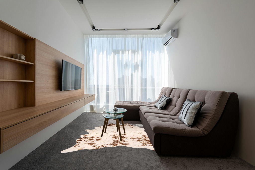 Cowhide rug decor ideas in Grey Living Room with Brown Couch