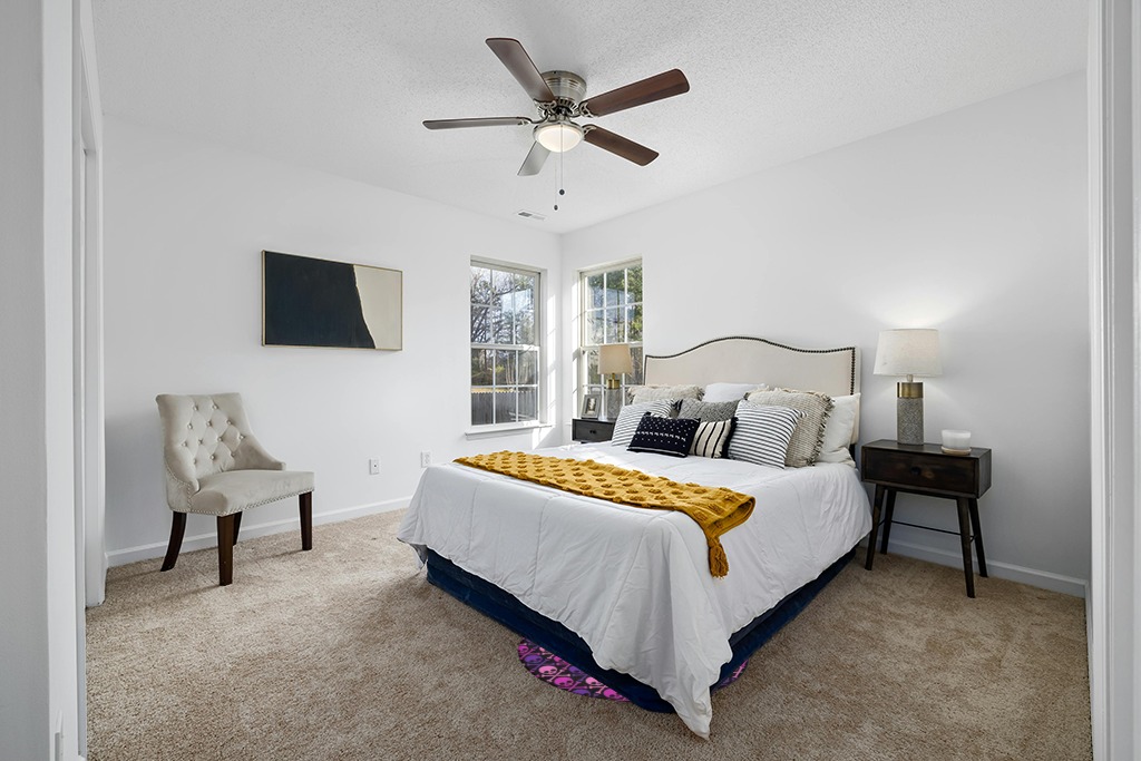 Rug over carpet ideas in White and Yellow Modern Bedroom